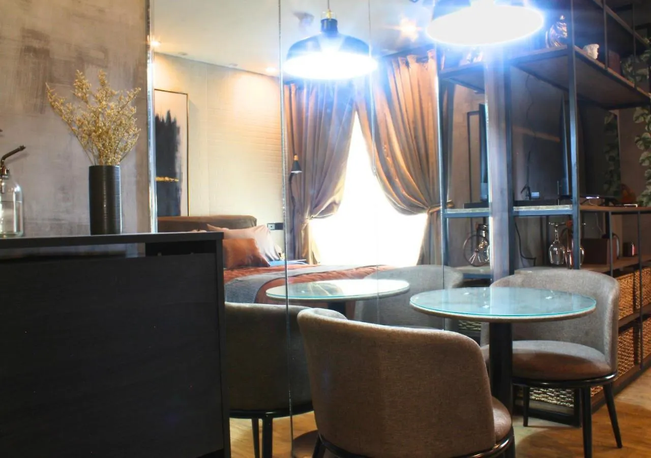 The Brass Burrow, Bel Air Soho Suites Manila Apartment
