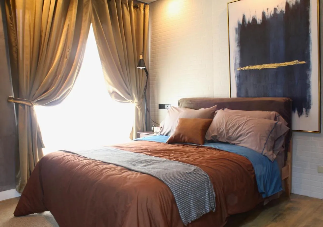The Brass Burrow, Bel Air Soho Suites Manila